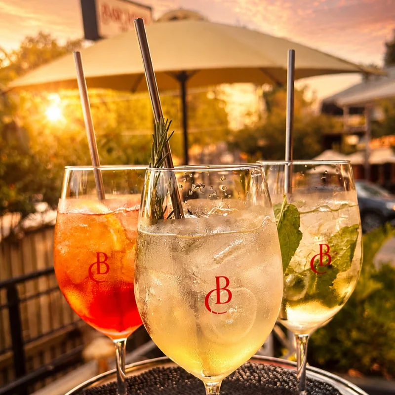 Barchetta spritz trio at golden hour